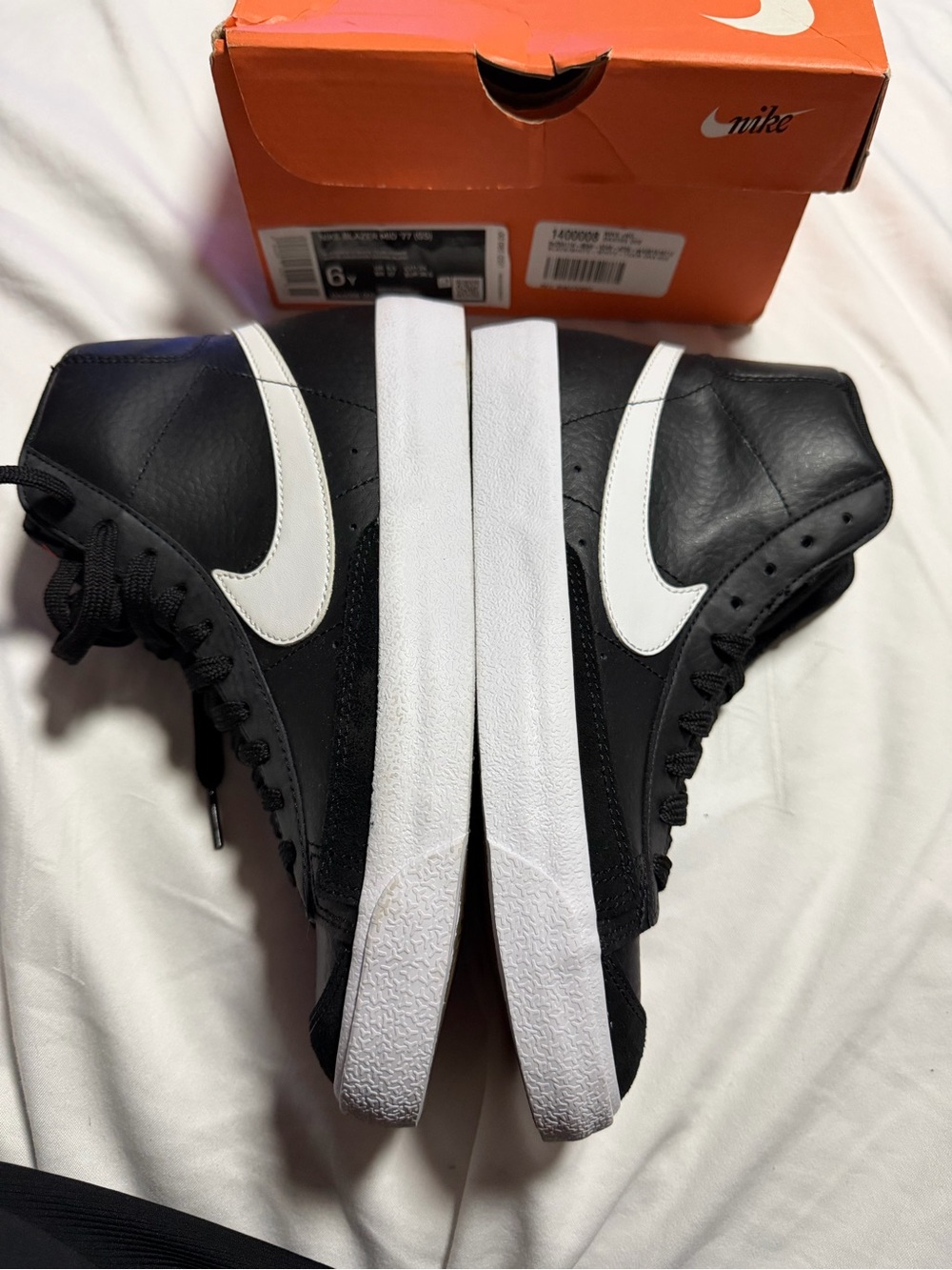 Nike Black and White High-Top Sneakers with White Swoosh